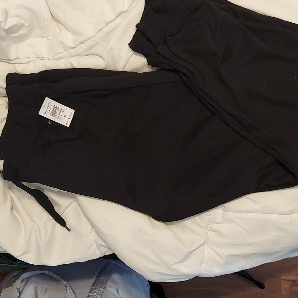 Six Lincoln New York clothing. Black pair of jogger sweatpants